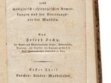 un vieux livre écrit posé sur une table