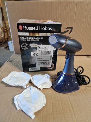 a box of tissues and a blow dryer sitting on a table