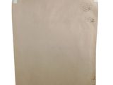 an old piece of paper with some dirt on it
