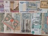 many different types of foreign currency on the table