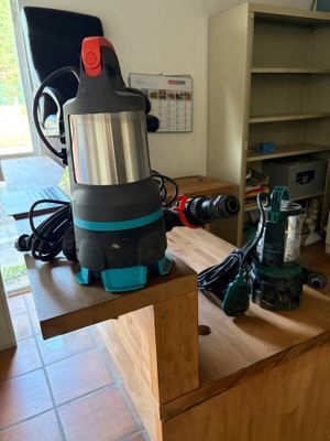a picture of a vacuum on a workbench in a home office