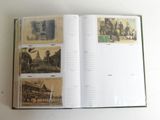 an open book with pictures of people and buildings on it