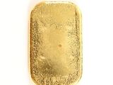 gold plated rectangular pendant on white background with copy space for text