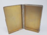 a small silver box with two open compartments
