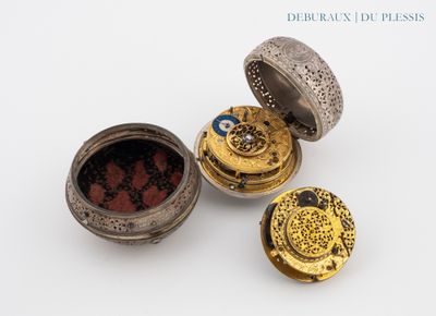 three different types of jewelry sitting on a white surface