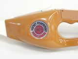 an image of a plastic bottle opener with a sticker on it