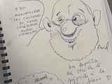 drawing of a cartoon character on a notebook with a pen