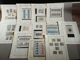 a lot of stamps on display on a table