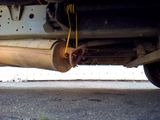 a close up view of a car ' s exhaust pipe