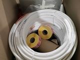 a box that has a bunch of hoses inside of it