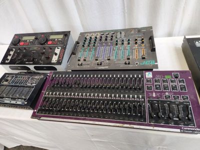 many different types of electronic equipment on a table