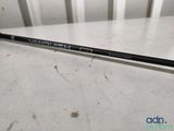 a close up of a golf club on a table