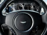 a close up of a steering wheel in a car