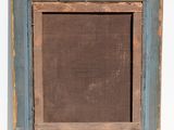 an old picture frame with a brown background and a blue border