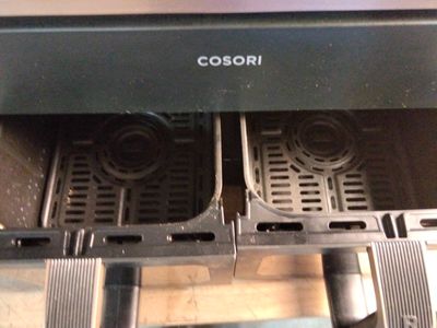 a close up of a toaster oven with a toaster in it