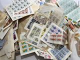 many different types of stamps on the table