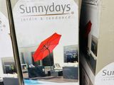 three boxes of sunways furniture on display at a store