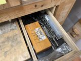 a wooden box that has some tools in it