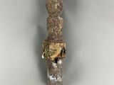 a close up of a piece of meat on a stick