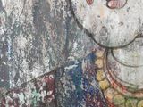a picture of a painting of a woman on the wall