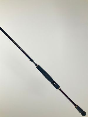 a close up of a fishing rod on a white background