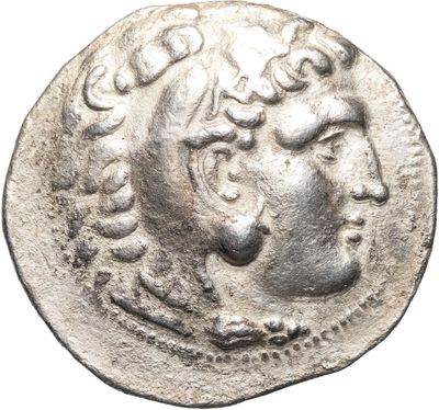 a silver coin with a man ' s face on it