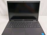 a close up of a laptop computer on a white surface