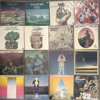 many different album covers on the wall of a store