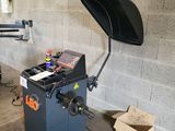 an image of a machine that is in a garage