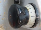 a close up of a black and white water meter