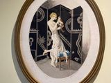 a painting on the wall of a room that has a picture of a woman on a chair