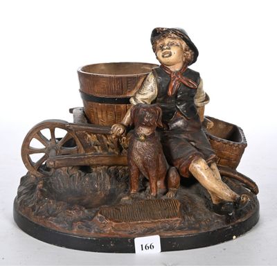 GROUPE en terre cuite patiné représentant le repos du vigner…