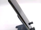 a close up of a cell phone on a stand