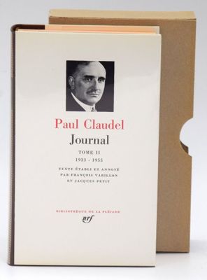 an open book with a picture of a man in a suit and tie