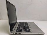 a laptop computer that is sitting on a table