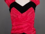 a black and pink dress on a mannequin mannequin mannequin mannequin mannequin mannequin mannequin mannequin mann