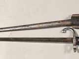 two tools that are laying next to each other on a table