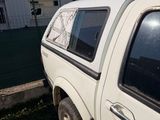a white truck parked in front of a building
