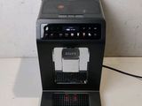 a coffee machine that is sitting on a table