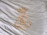 a white sheet with a picture of a crown on it