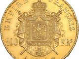 a close up of a gold coin on a white background
