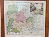 une carte encadrée de la ville de Londres dans un cadre en bois