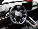 a steering wheel and dashboard of a car on display