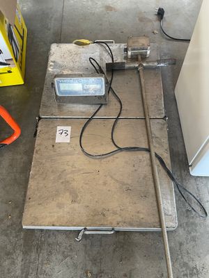 an image of a scale sitting on the floor