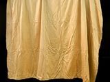 a curtain that is hanging on the wall