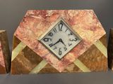 a clock that is sitting on top of a table