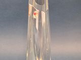 a clear glass vase with a fish inside of it