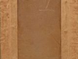a close up of a picture frame on a wooden surface