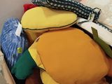 a cardboard box filled with stuffed toys and other items