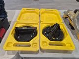 two yellow trays that are sitting on a table